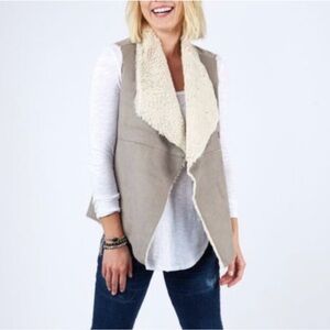 Fur vest by Charming Charles
